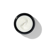 Texture of BL+ The Cream showing smooth white cream in open jar