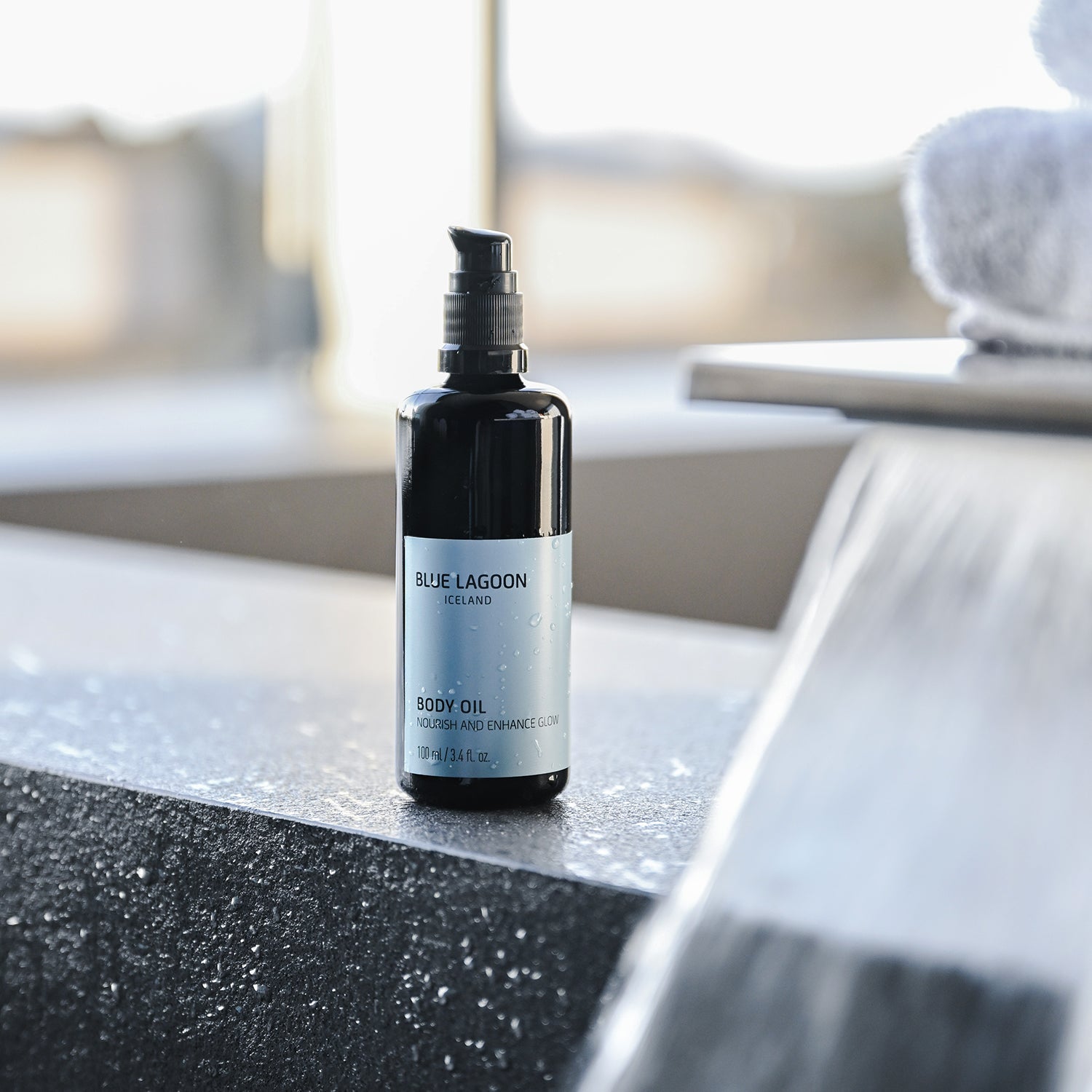 Body Oil bottle 3.4oz on stone surface