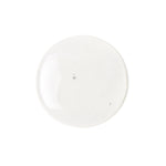 Texture of Silica Purifying Shampoo showing a clear, lightweight gel with a smooth, even surface