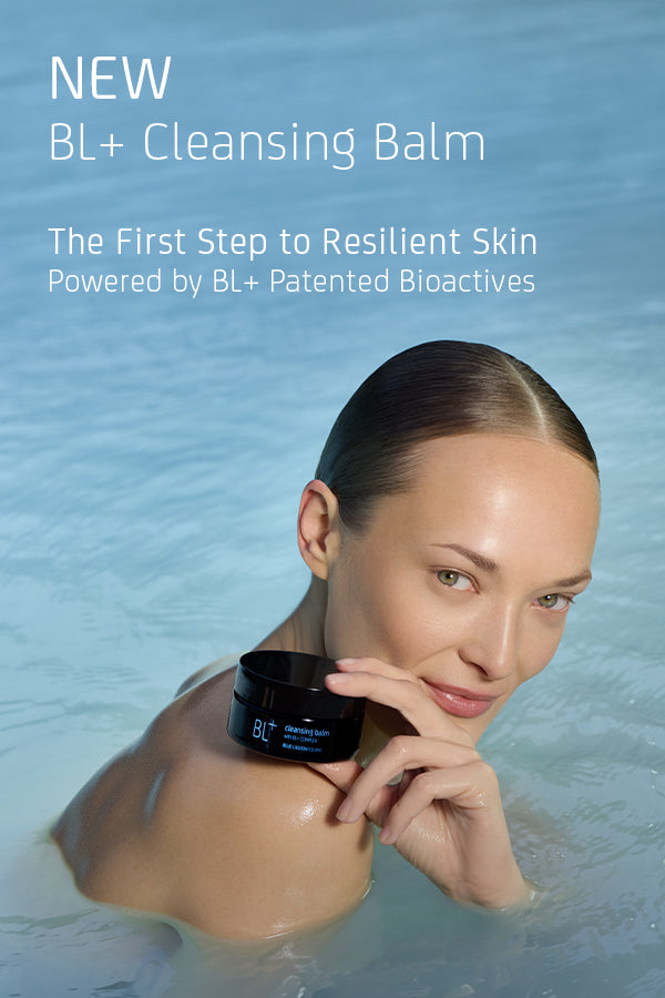 Woman holding a BL+ cleansing balm with a blue gradient background