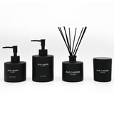 Hand Wash, Hand Lotion, Reed Diffuser and Candle arranged on white background